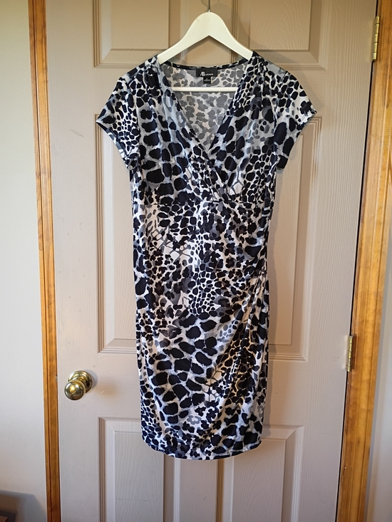 Avenue Dresses & Skirts - Avenue Black & White Animal Print Wrap Dress